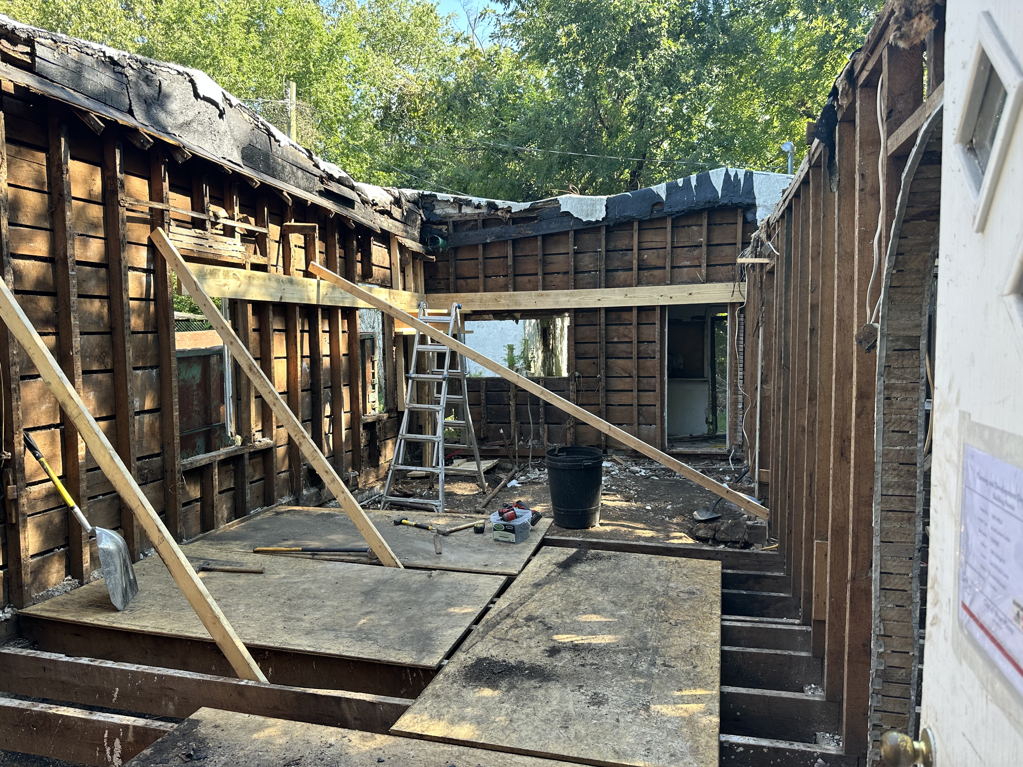 Marion Ohio home interior before renovation &mdash; exposed framing and subfloor replacement
